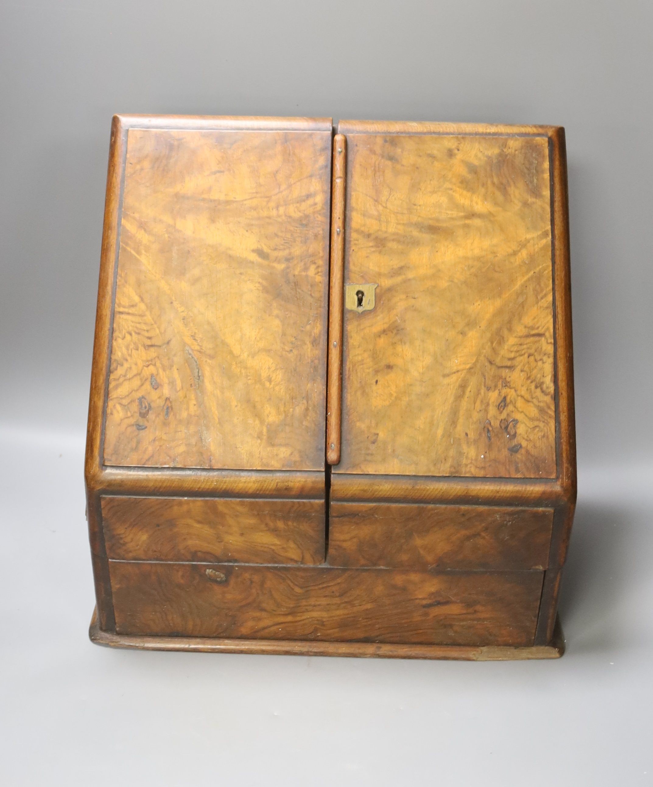 A Victorian walnut stationary cabinet, an Edwardian inlaid oval tray and a group 7 brass fingerplates